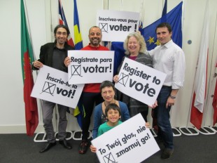 Register to vote signs in various languages