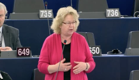 Jean speaking in a debate on human rights breaches